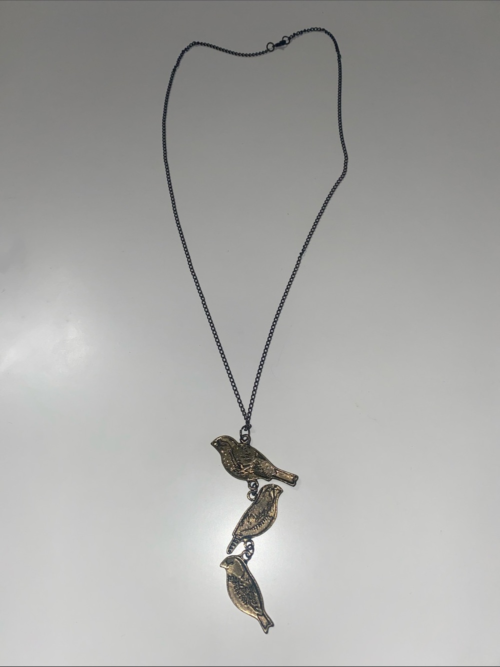 Three Bird Pendant Necklace in Antiqued Gold